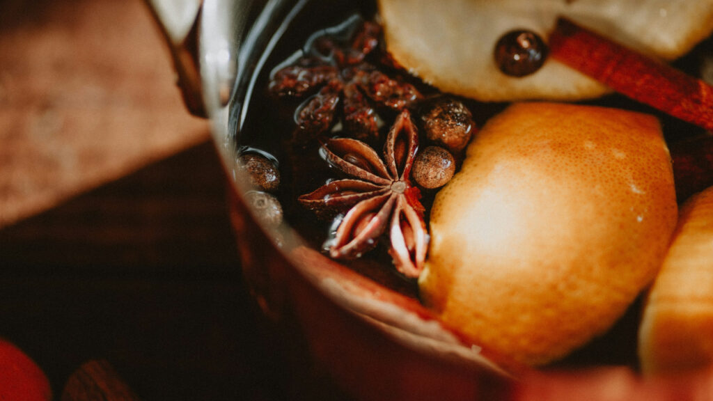 pot-filled-with-fruit-and-nuts-on-top-of-a-table-40Pc3ANmmIM simmer pot