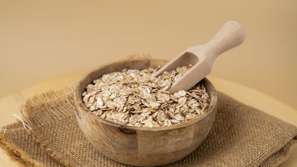 Raw oatmeal porridge Gluten free cereals. Health gut benefits. Concept of alternative whole spelt grain ingredient. Vegetarian diet recipes. Plant-based lifestyle. Copy space Protein rich