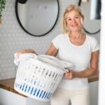 woman holding a laundry basket