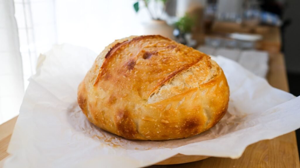Homemade artisan or sourdough bread. on the kitchen counter top