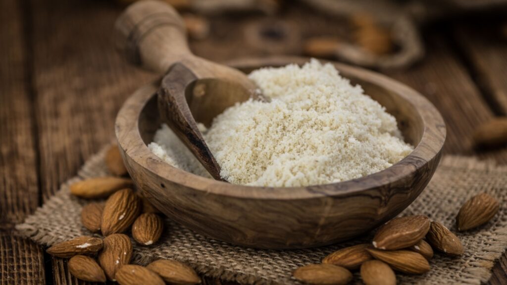 Some fresh Almond Flour (selective focus; close-up shot)